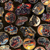 Collage of red orange blue Trucks, black red low rider Motorcycles, flame painted black red blue Hot Rods, orange red black Vintage vehicles on a motley black brown cotton fabric