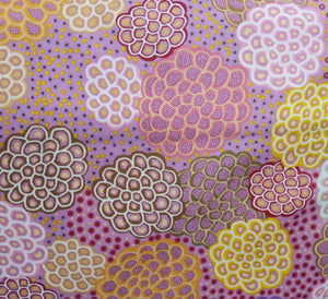 pink brown yellow interpretation of lotus flowers Australian Indigenous fabric