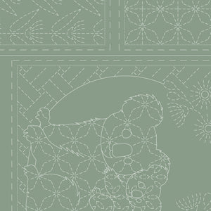 Green sashiko panel with a central koala and baby design outlined in white stitch guides, framed by traditional geometric and floral Japanese sashiko blocks – DV4098