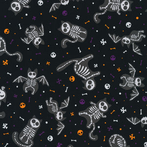 Spooky Halloween skeletons glow in the dark black white bat cat orange purple bones skulls on black background Robert Kaufman RK22464282
