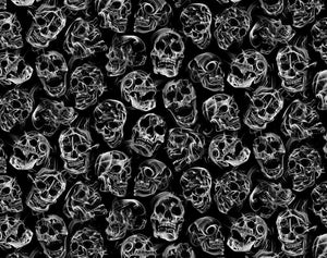 Various white skulls laughing alight with white flames on a black background.      TTCD2099