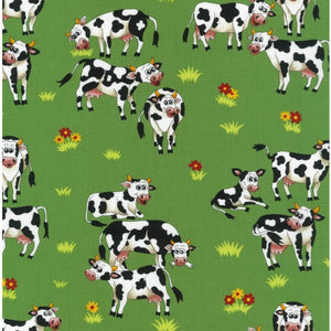 black white cows in a green field with red yellow flowers animated 80500.103