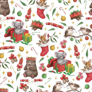 Australian Christmas fabric with baby Australian brown Kangaroo joey in a red Christmas stocking, grey Koala sitting in a gift- wrapped box, spiky Echidna wearing a red Christmas hat, Kookaburra bird in tree with green, red and yellow baubles and cuddly wombat opening a cracker - DV5000
