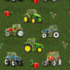 Tractors coloured green red blue decorated with christmas lights candy canes gift wrapped boxes surrounded by green grass 1117O