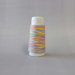 thread on cone for use with Sashiko stitching in a variegated in colours of a pastel rainbow with blue, pink, yellow, green LC89.303
