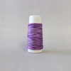 thread on cone for use with Sashiko stitching in a variegated coloured in shades of purple and cream LC89.403